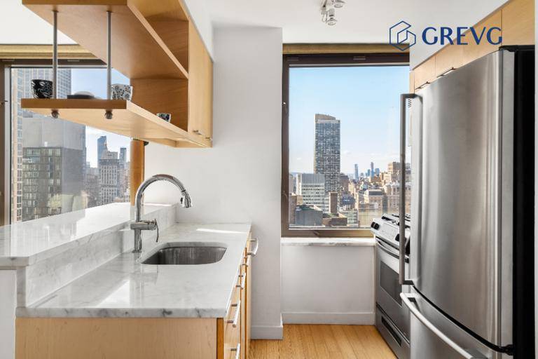 Furnished. Sun flooded corner studio apartment at Bryant Park Tower, with unobstructed Southern and Eastern exposures views from the 36th floor, which includes the Chrysler Building, Empire State Building and ...