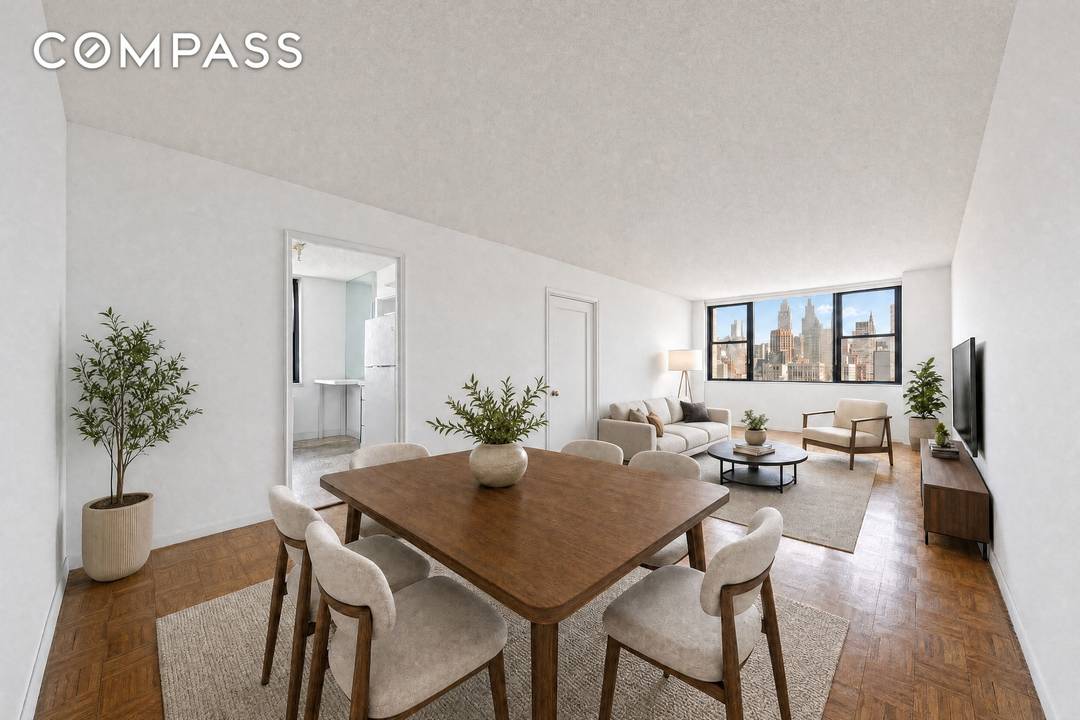 Welcome home to your light filled corner residence at 201 East 17th Street, Apartment 22G, with incredible city views.