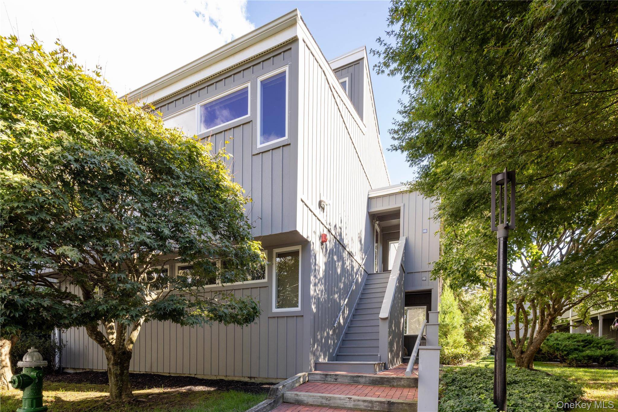 Welcome to The Mews, unit 16, an impeccably renovated two bedroom, two bath property that captures East Hampton chic at its finest.