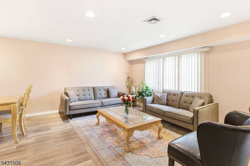 Welcome to 26 Cornell Street, a beautifully updated custom split level in West Orange's coveted St.