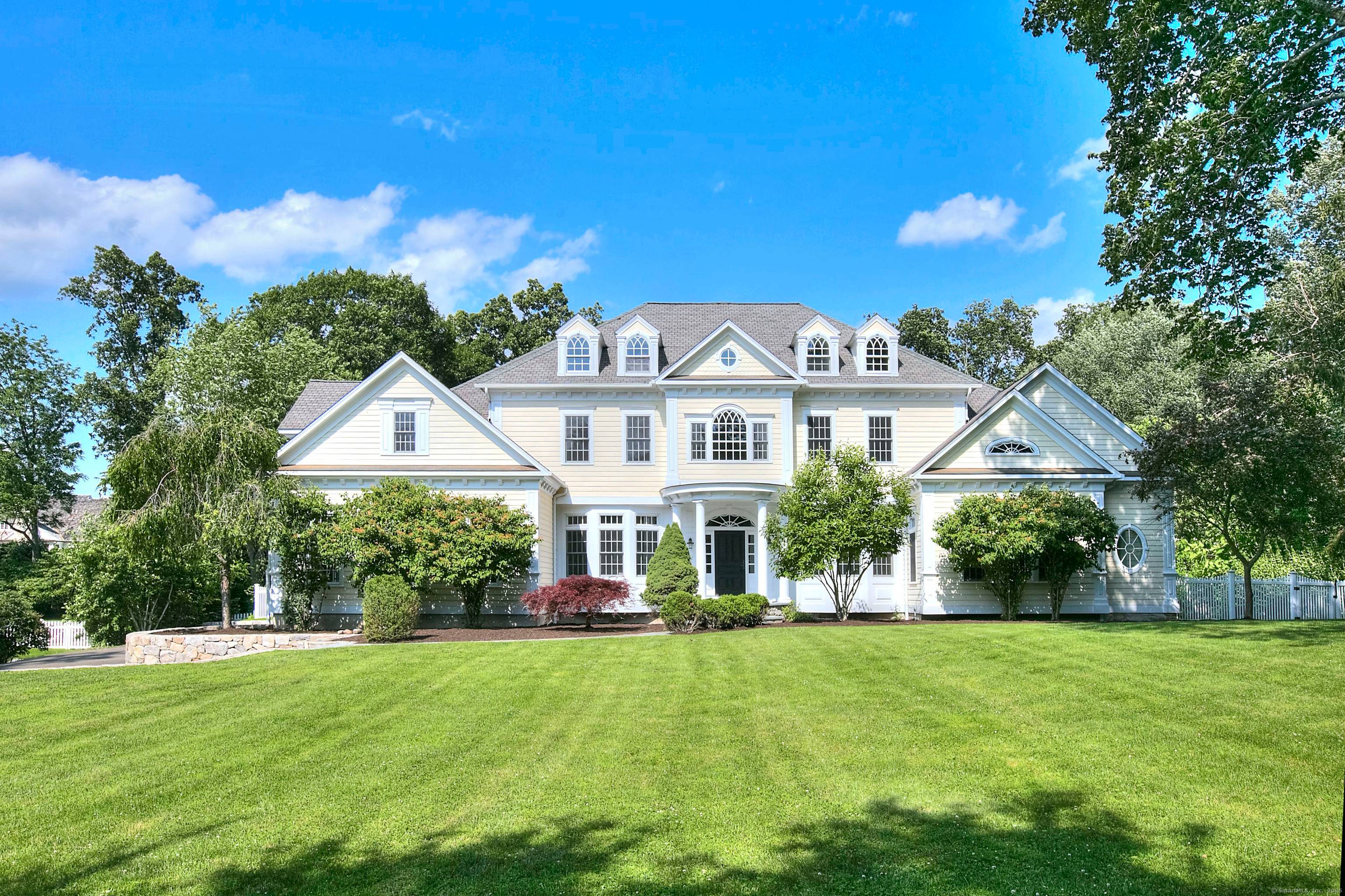 Tucked away on a sought after Westport cul de sac, this elegant 5 bedroom home offers the perfect blend of luxury, comfort, and convenience.
