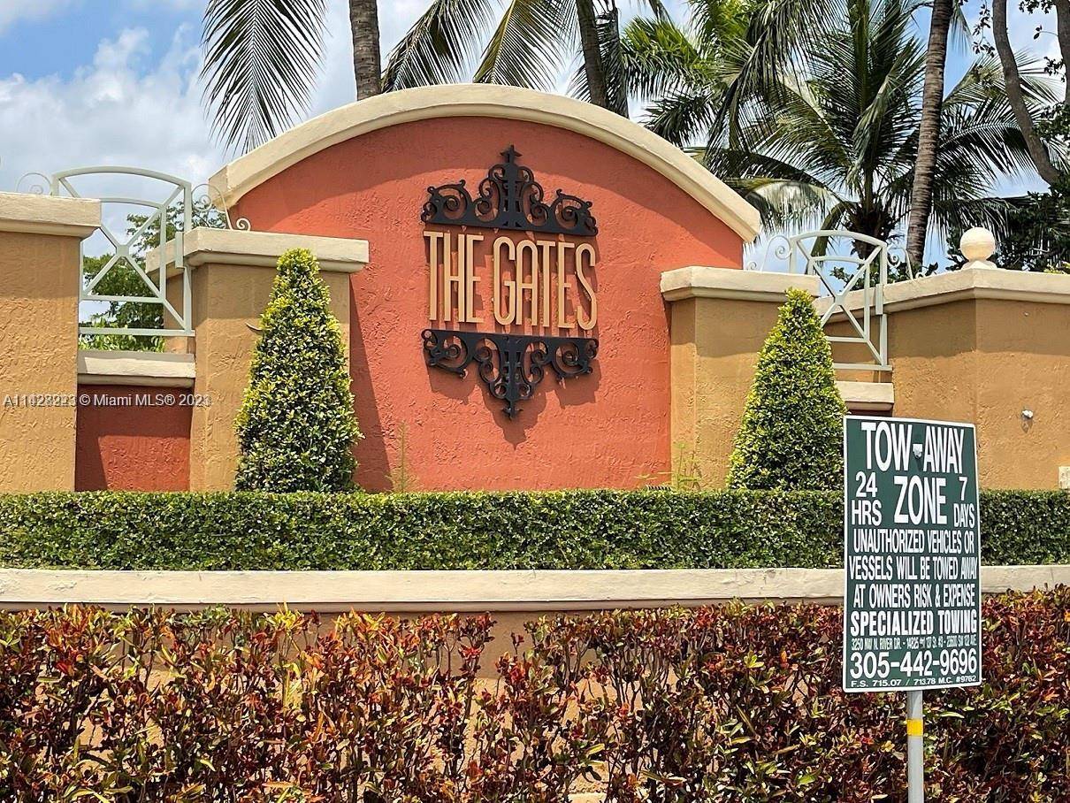 2 STORY VILLA IN THE DESIRABLE GATED COMMUNIITY OF THE GATES AT DORAL ISLE.