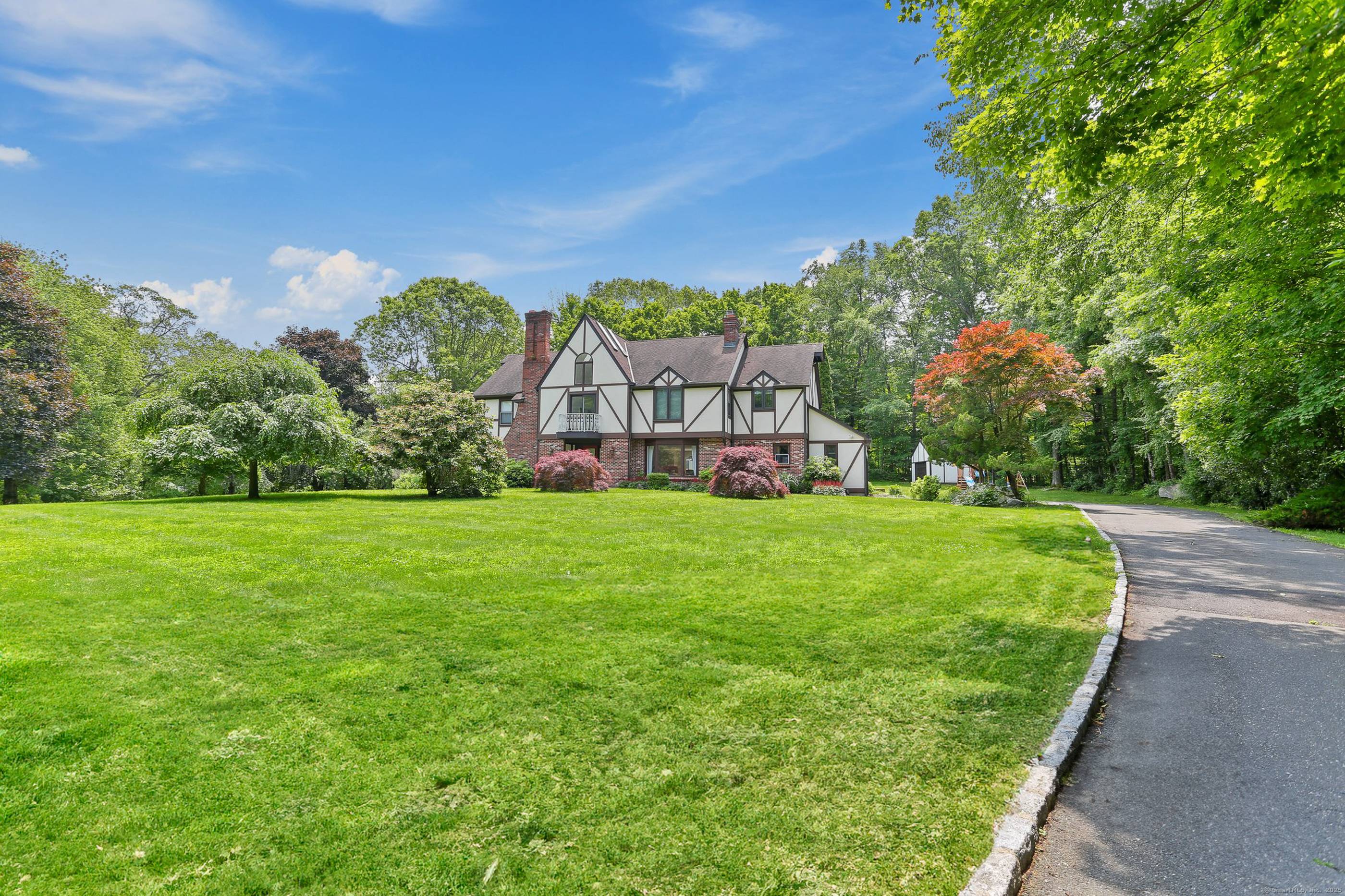Classic Tudor charm meets thoughtful updates in this beautifully redesigned home, tucked away on a quiet cul de sac just moments from Weir Farm National Park.