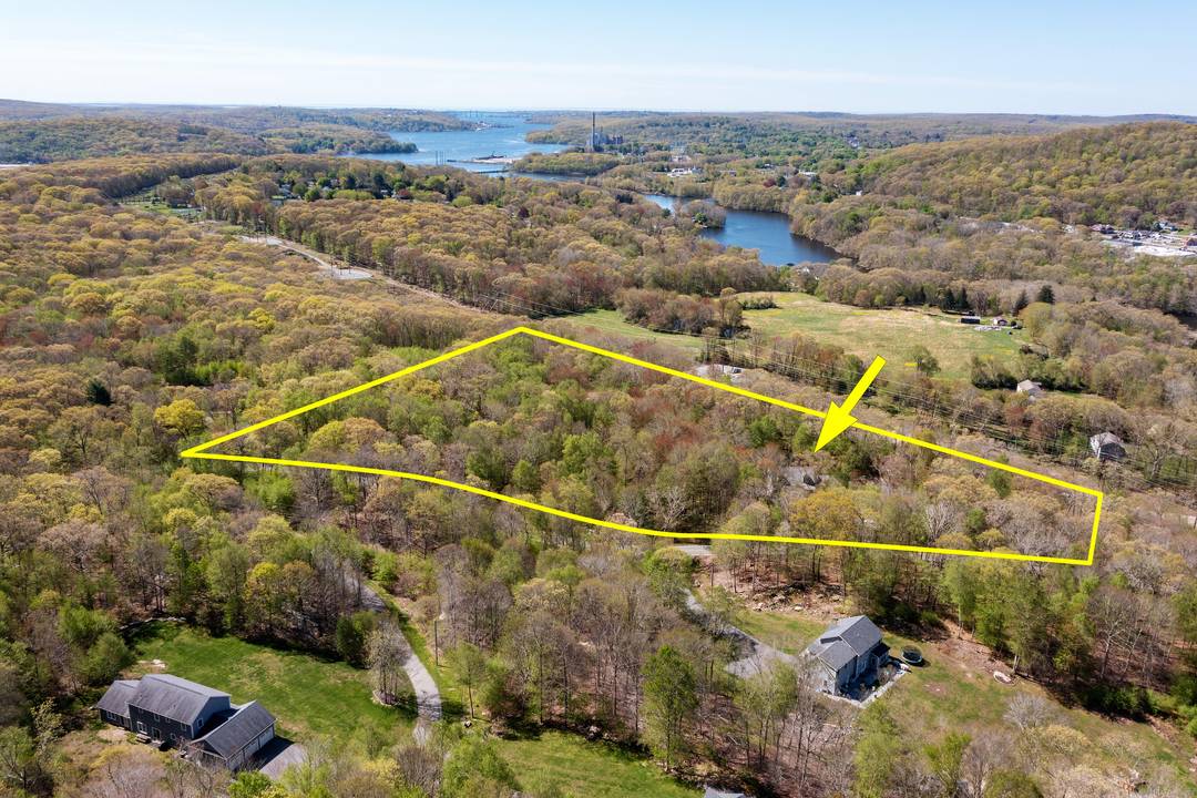 This young 3 bedroom, 3 bath expandable Cape is set on two lots totaling nearly 12 acres, offering unmatched privacy and scenic views over the property's orchard featuring 11 apple ...