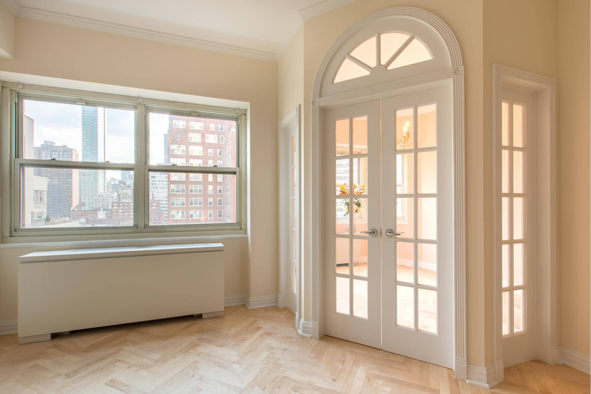 Welcome to this beautifully renovated and sunny oversized one bedroom junior four home.