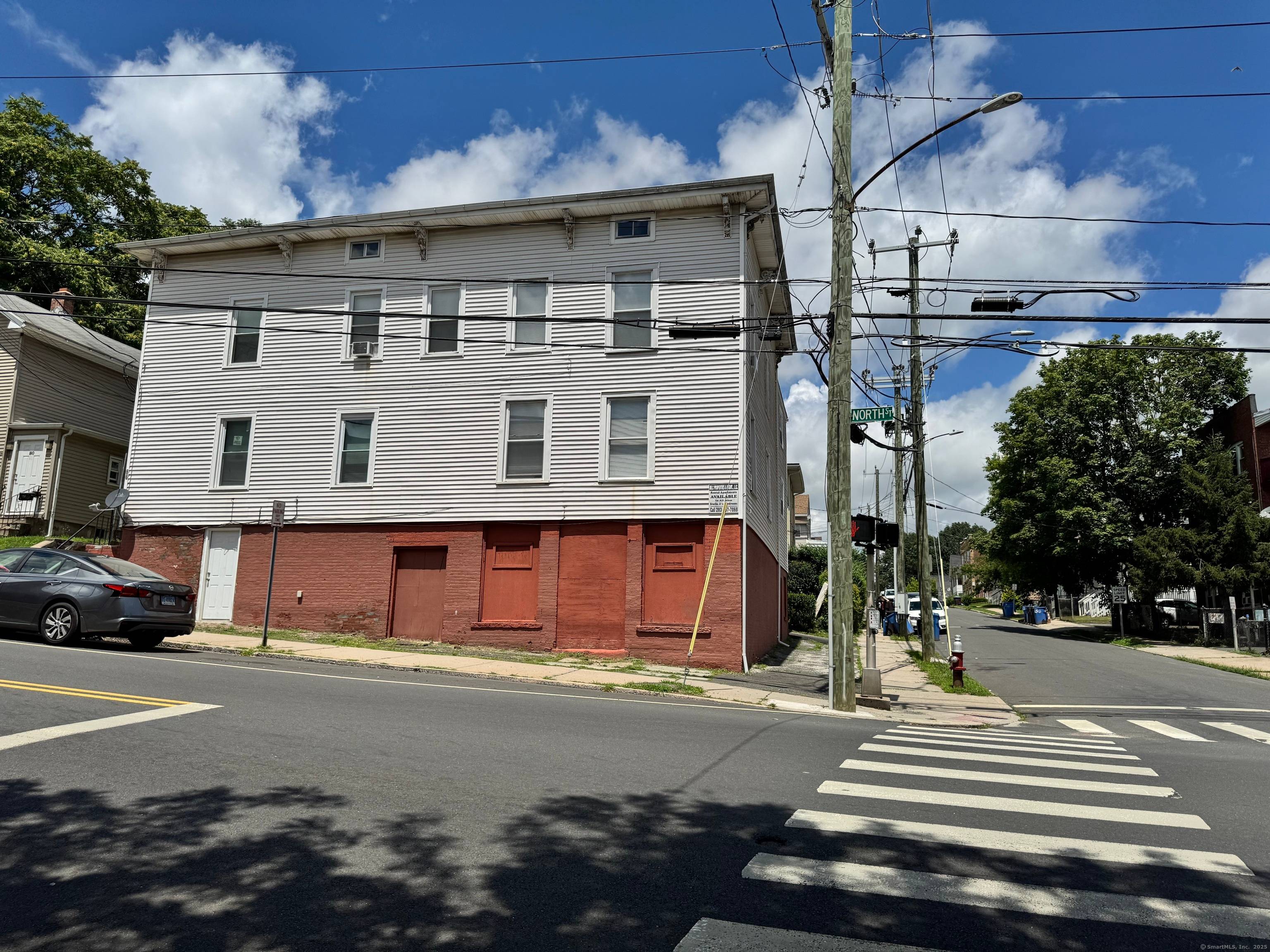 Well Maintained Rare Four Family Building showing Pride of Ownership !