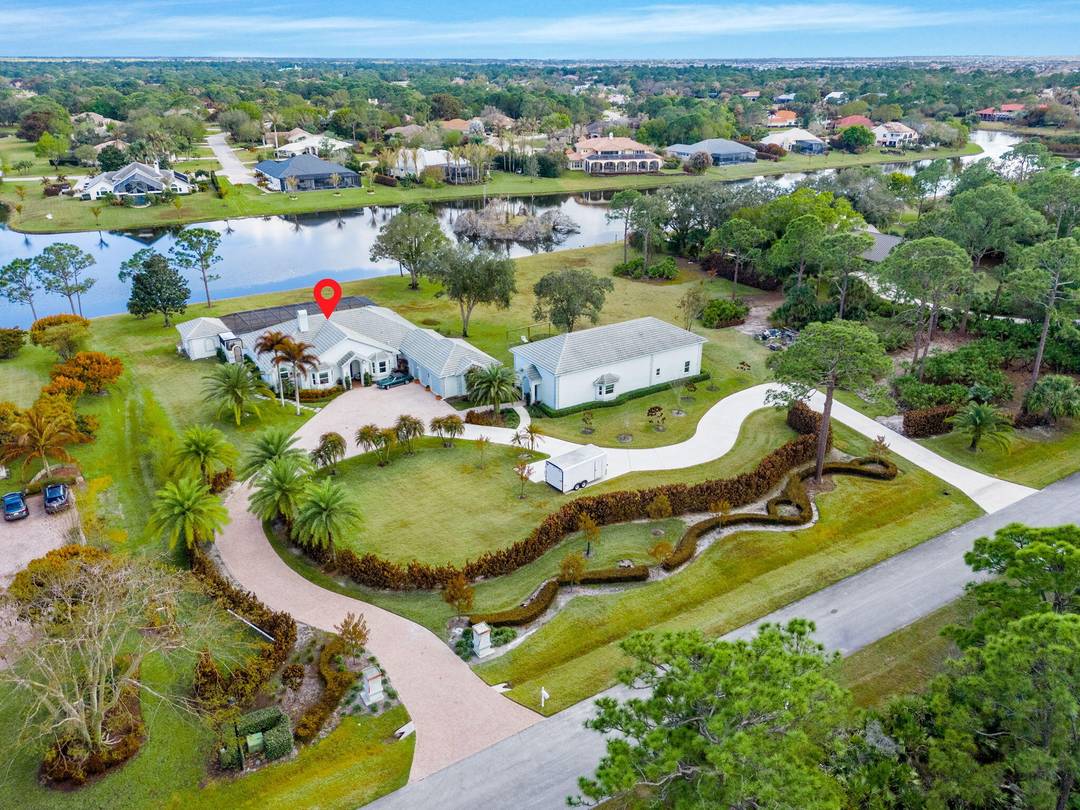 Custom Estate lakefront home in PGA Village.