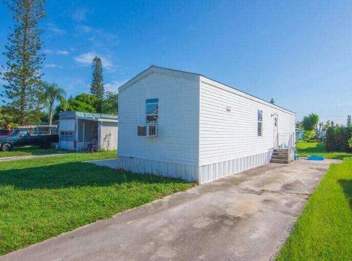 Affordable living is found in this 2 bedroom, 2 bathroom mobile home located in an ALL AGE, pet friendly community in the heart of Stuart !