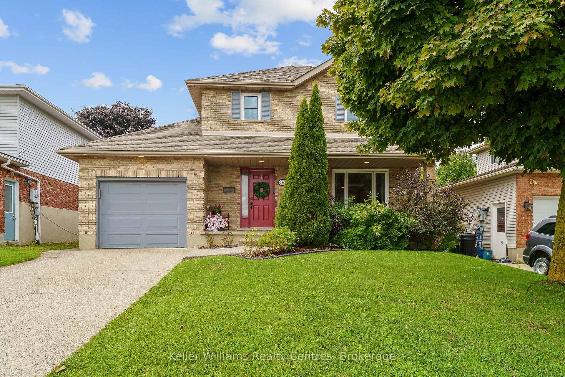 This red door brick beauty checks every box 3 bedrooms, 3 bathrooms, and 1, 892 square feet of stylish, family friendly living across 3 fully finished levels complete with curb ...