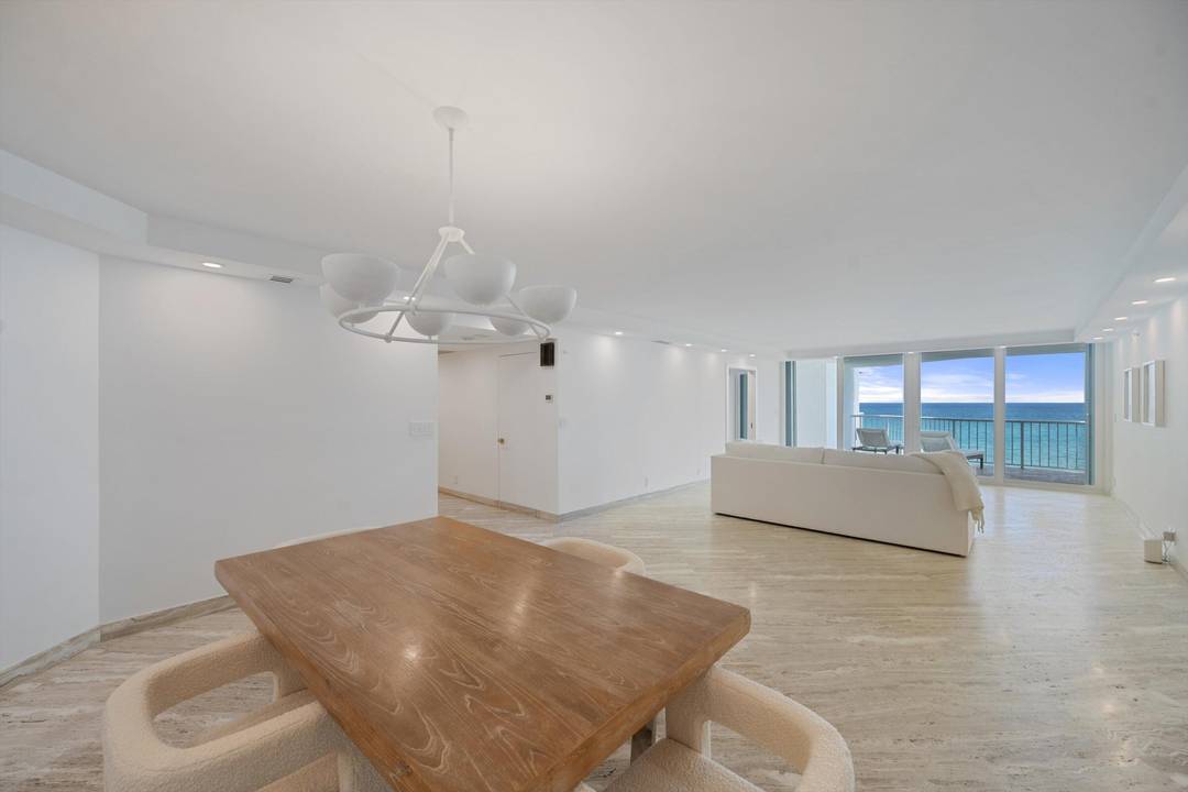 Step into this stunning 6th floor residence at The Enclave's North Building, where southern exposure floods the space with natural light and showcases sweeping views of the ocean, pool, and ...