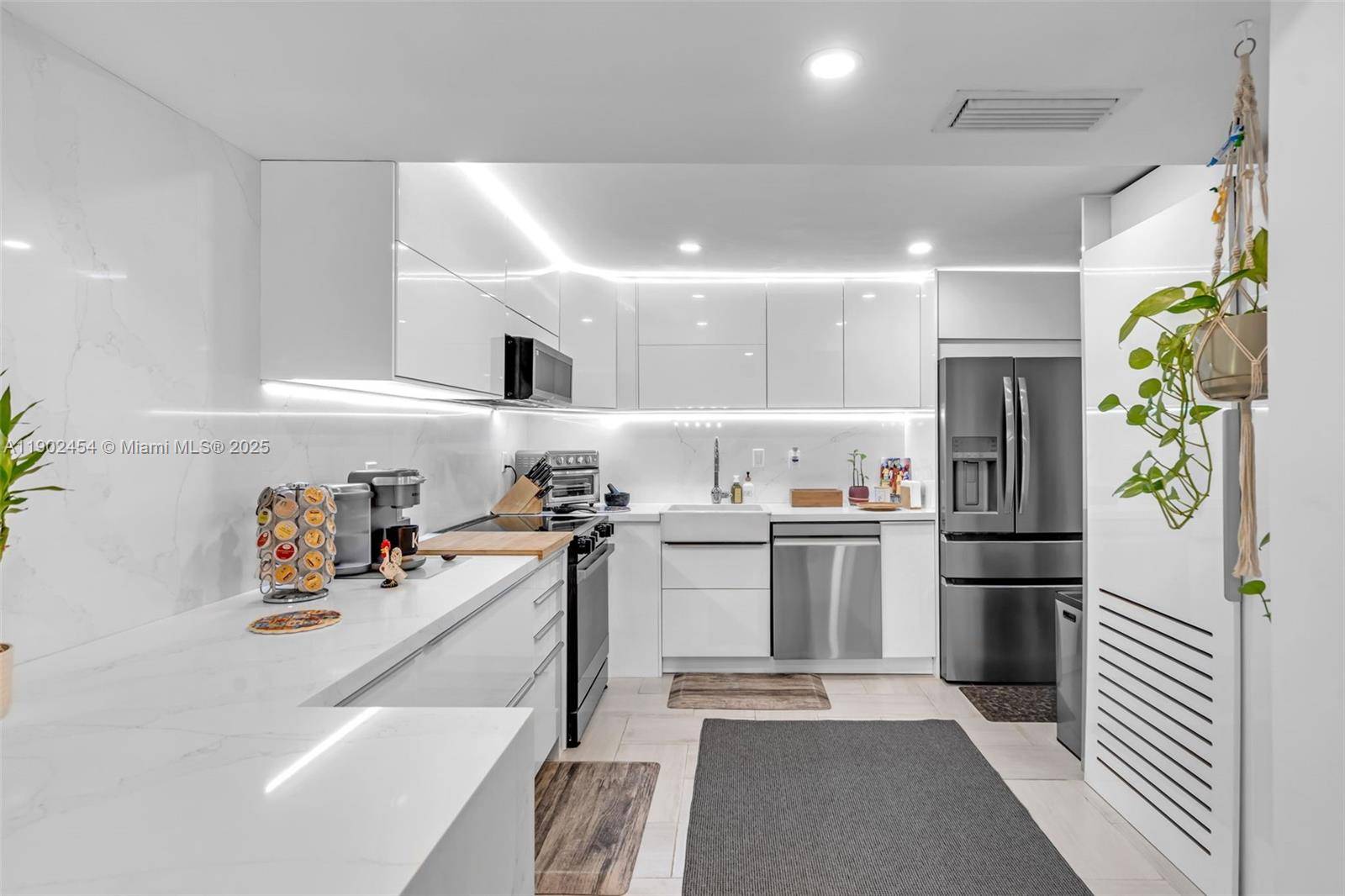 Updated 2 bed 2 bath lanai residence with bright, open living spaces in Ocean Village, located just a 6 minute walk to the beach.