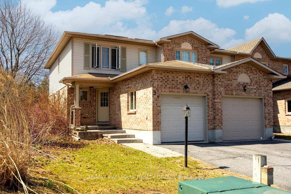 Nestled at the end of a tranquil cul de sac, this elegantly updated end unit home offers both privacy and convenience.