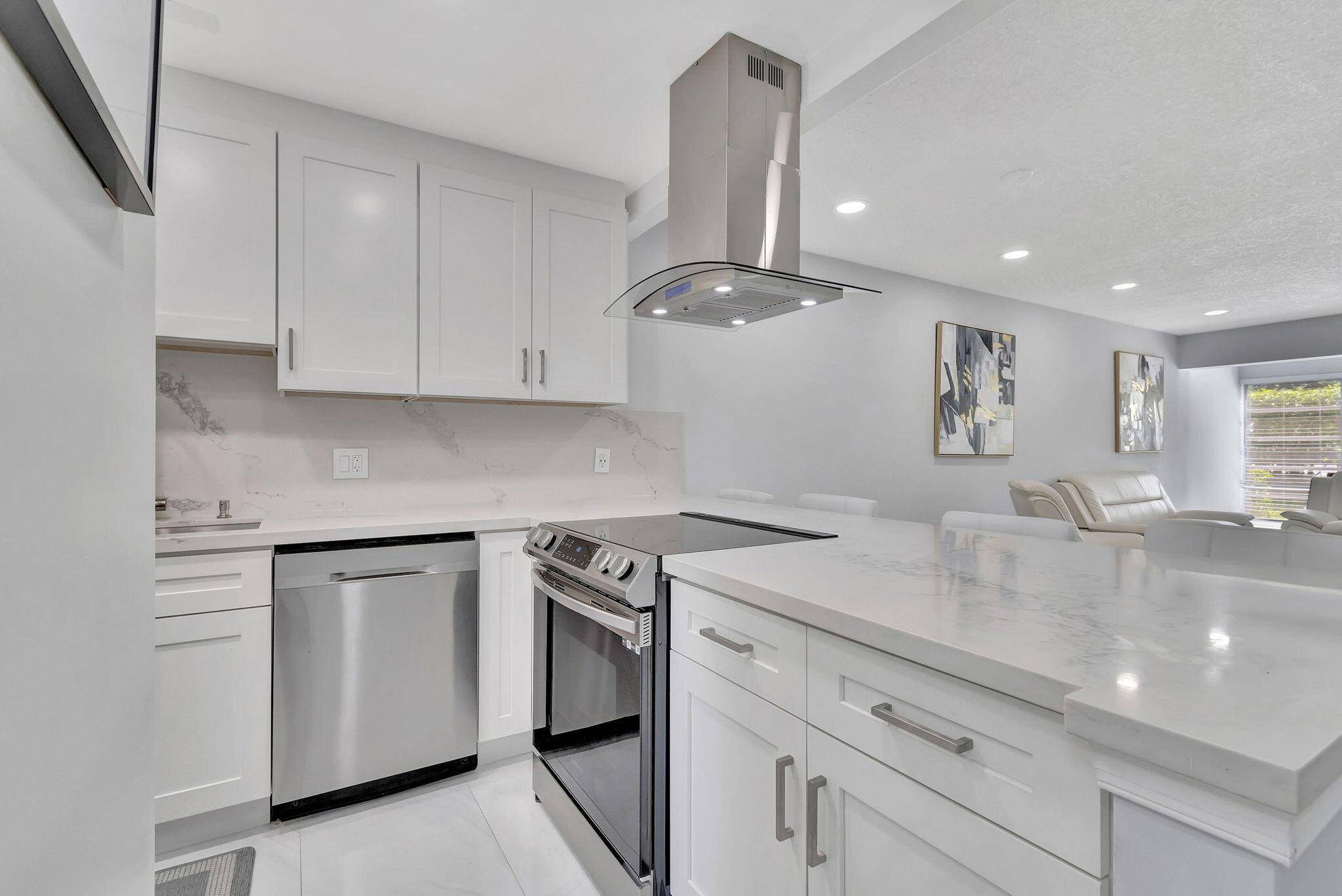 Welcome to 2510 Black Olive Blvd, 104, a fully renovated 2 bedroom, 2 bathroom first floor corner unit in Delray Beach.
