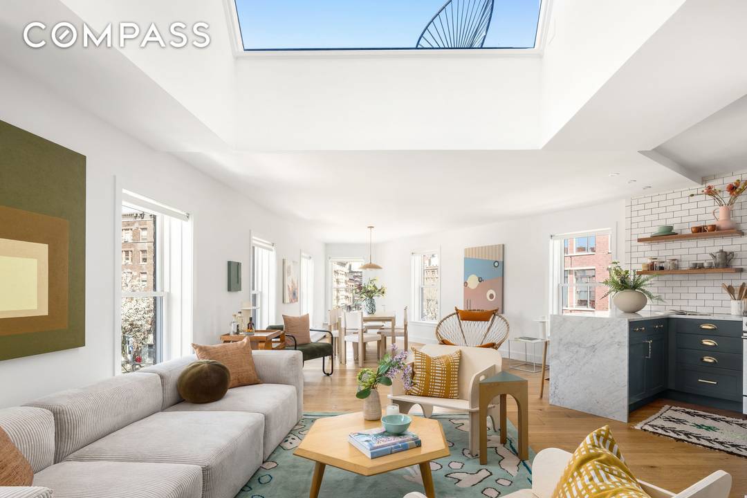 Positioned atop a historic 1850s building at the intersection of Greenwich Village and the West Village, this full floor penthouse is defined by remarkable light, open exposures, exceptional private outdoor ...