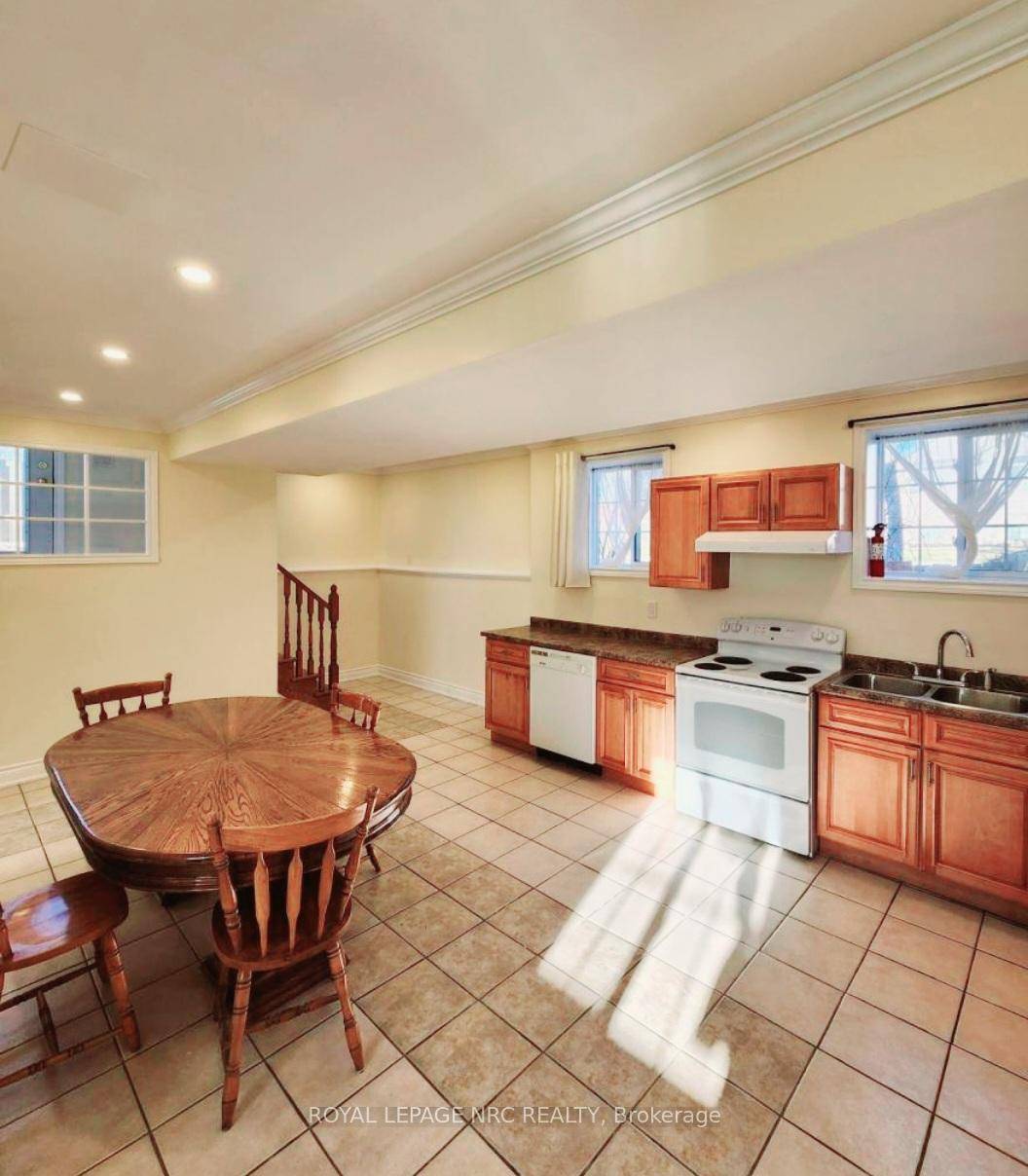 An all inclusive Bright, cozy and spotless one bedroom suite on the lower level of a raised bungalow with a rare 8'6 height ceiling.