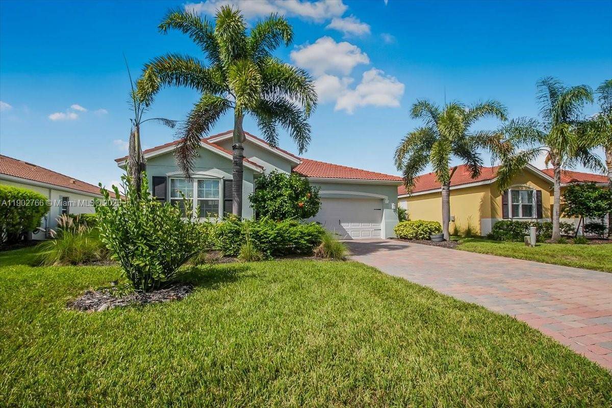 Beautiful single family home with open floor plan and high volume ceilings.