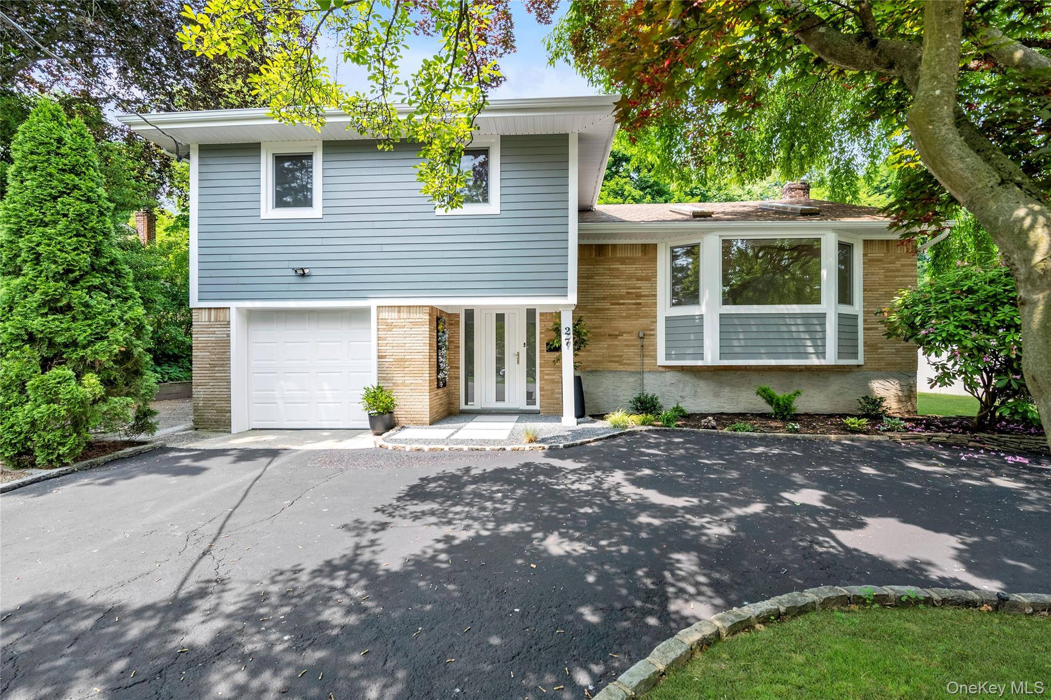 Totally updated with modern finishes, this split level home offers immediate occupancy and enjoyment.