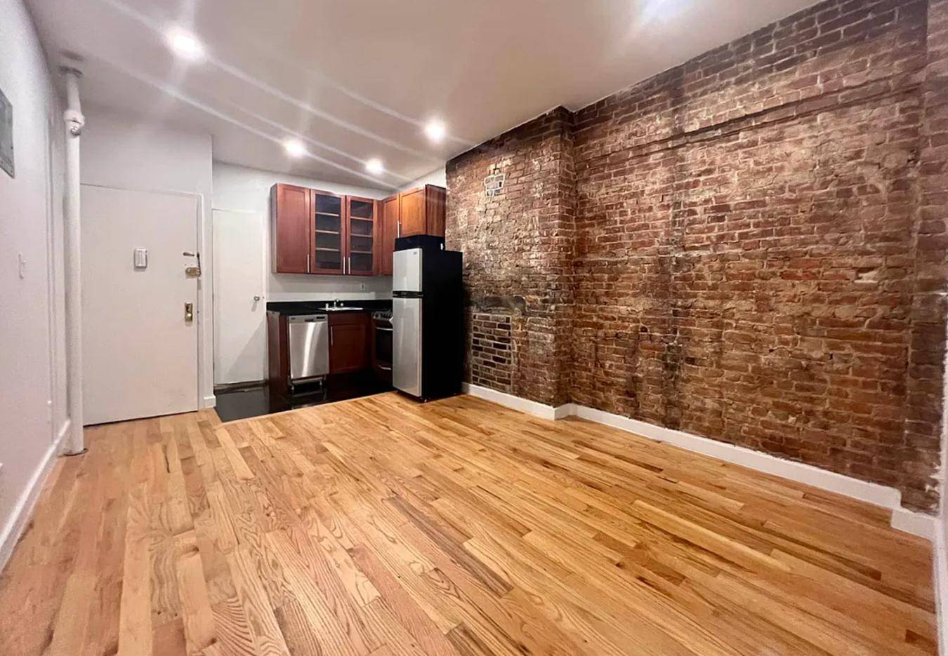 Spacious queen size 1 bedroom with enough space for an L shape couch and a formal dining table or desk.