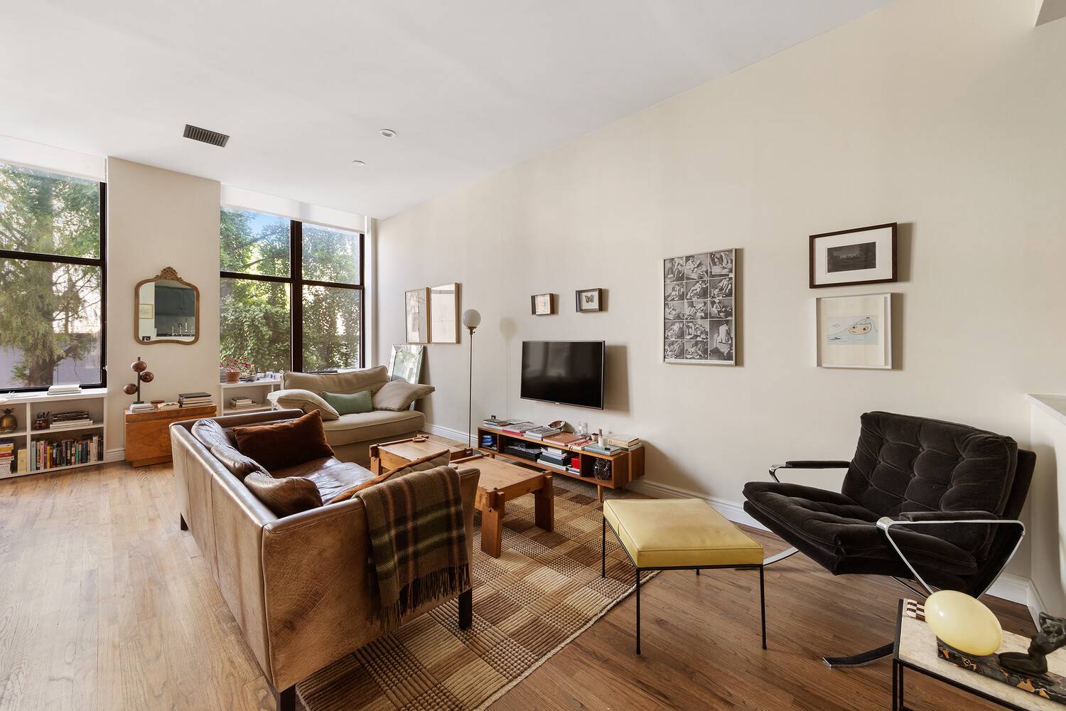 This beautifully renovated one bedroom, one and a half bath residence blends timeless craftsmanship with modern luxury.