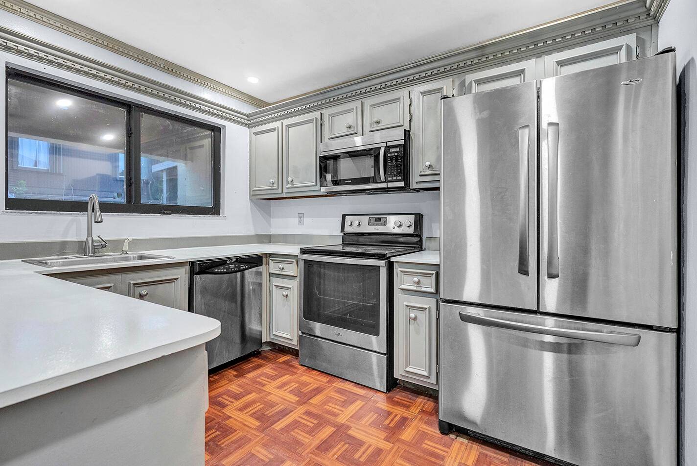 Welcome to this spacious and beautifully maintained 3 bedroom, 2 bathroom two story condo in West Palm Beach !