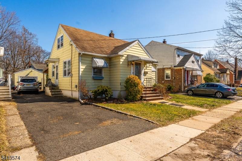 Nestled on a picturesque, tree lined street in Rahway, this charming and well maintained property offers both comfort and convenience.