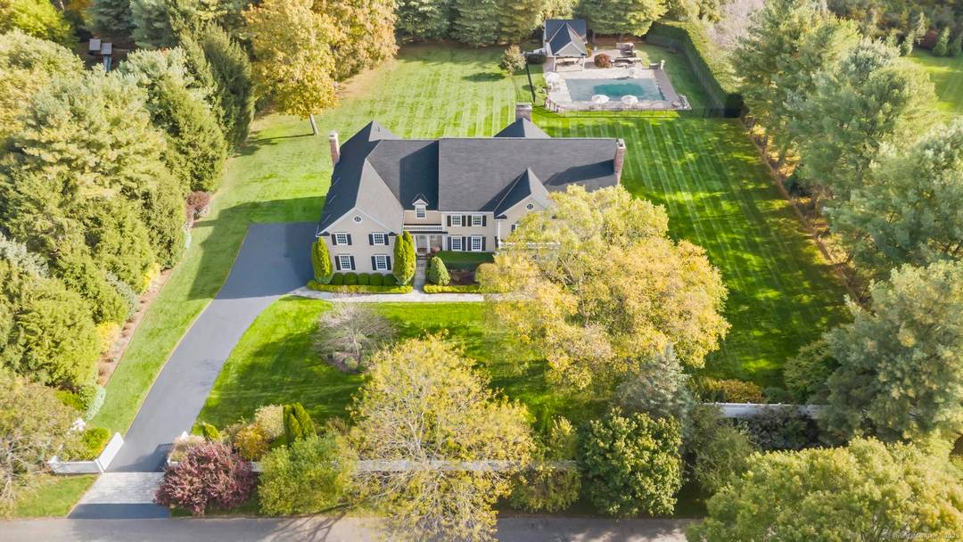Welcome to an unrivaled sanctuary of sophistication at 342 Midlock Road, gracefully situated in the prestigious enclave of Greenfield Hill.