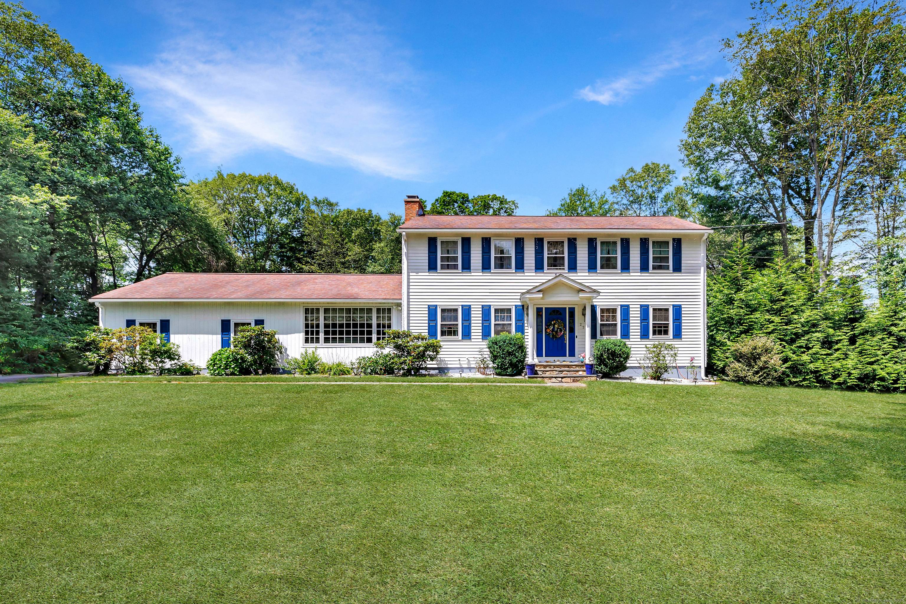 Welcome to 23 Bonita Drive a beautifully maintained 8 room Colonial tucked away on a private wooded 1.