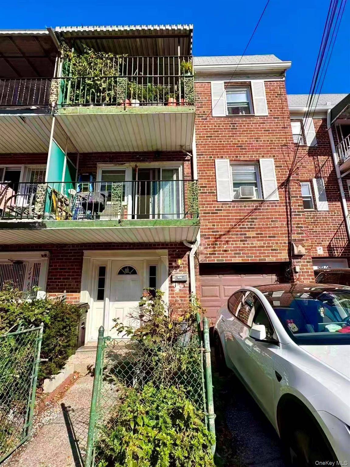 Welcome to 144 91 37th Avenue, Flushing a well maintained brick Two family home in the heart of Downtown Flushing !