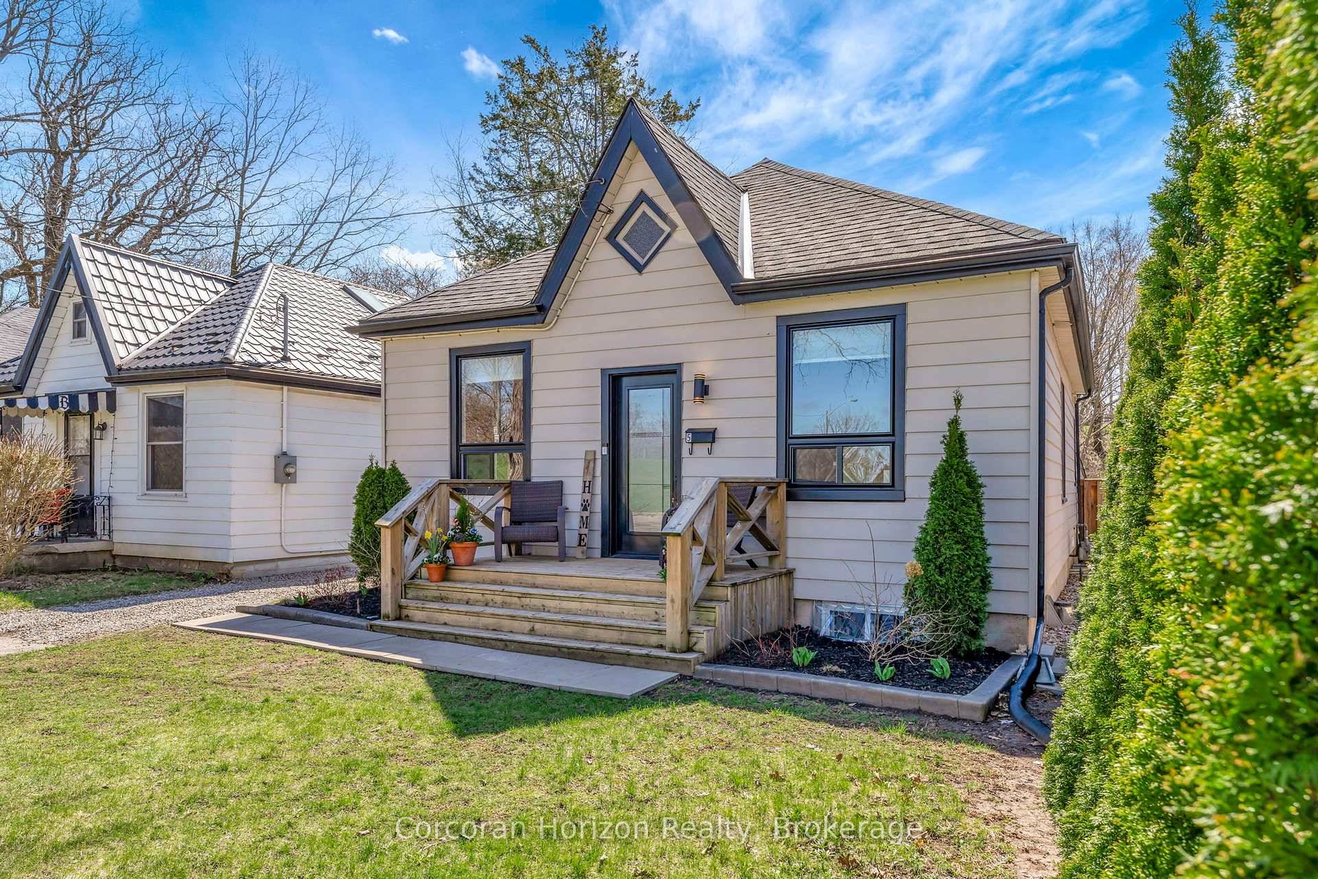 Welcome to 5 Stirton Avenue a charming and updated Brantford cottage tucked away on a quiet court, just steps from scenic river walking trails and a nearby dog park.