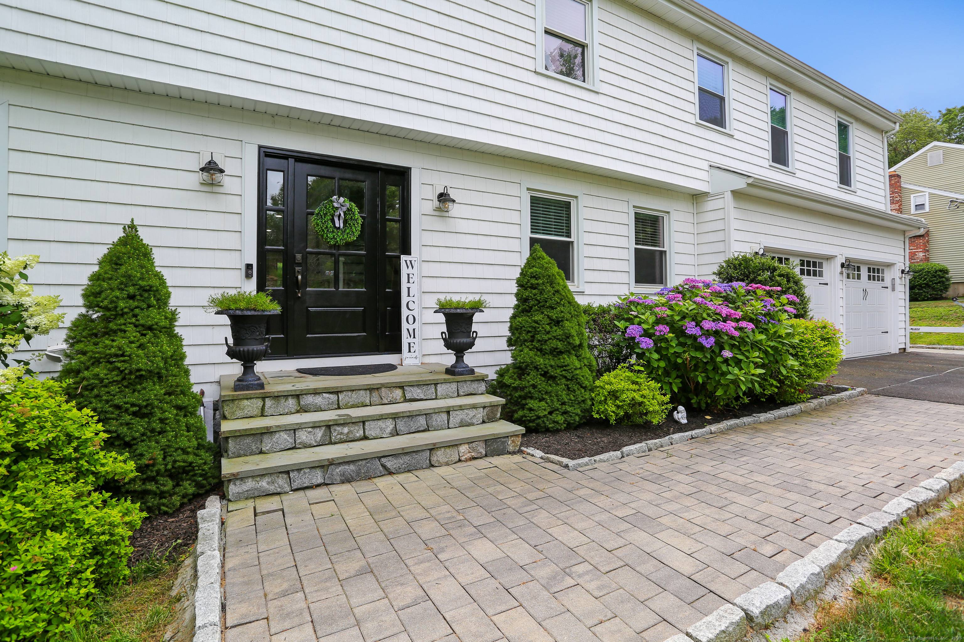 Beautifully updated colonial with luxury finishes and exceptional outdoor Space.