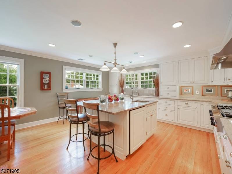 Immaculate move in ready custom home with over 3500sqft of living space situated on a quiet street in North Caldwell.