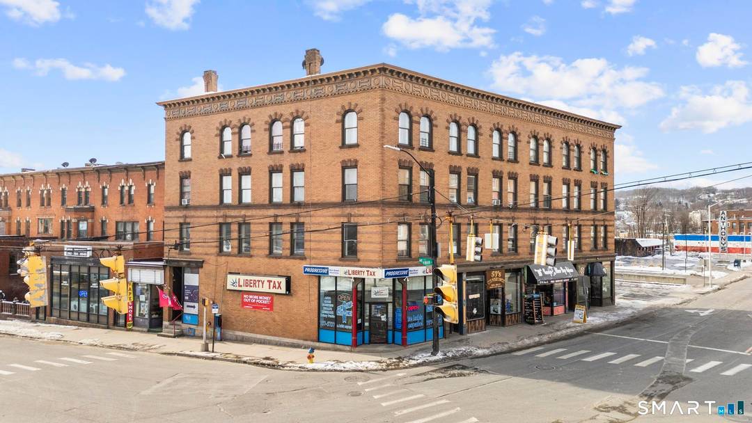 Exceptional mixed use investment opportunity Downtown featuring three contiguous parcels totaling 0.