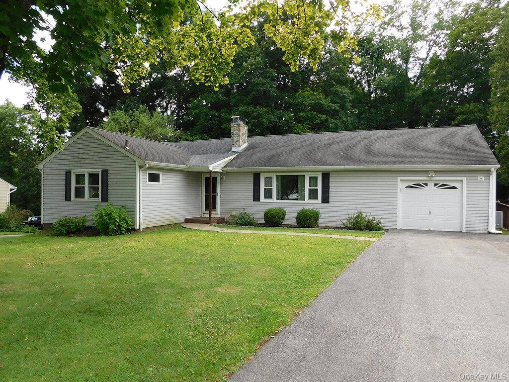 A Community Neighborhood Welcoming With Its Mixture Of Cultures And Age Groups Surrounds This Three Bedroom, Two Bath Ranch.