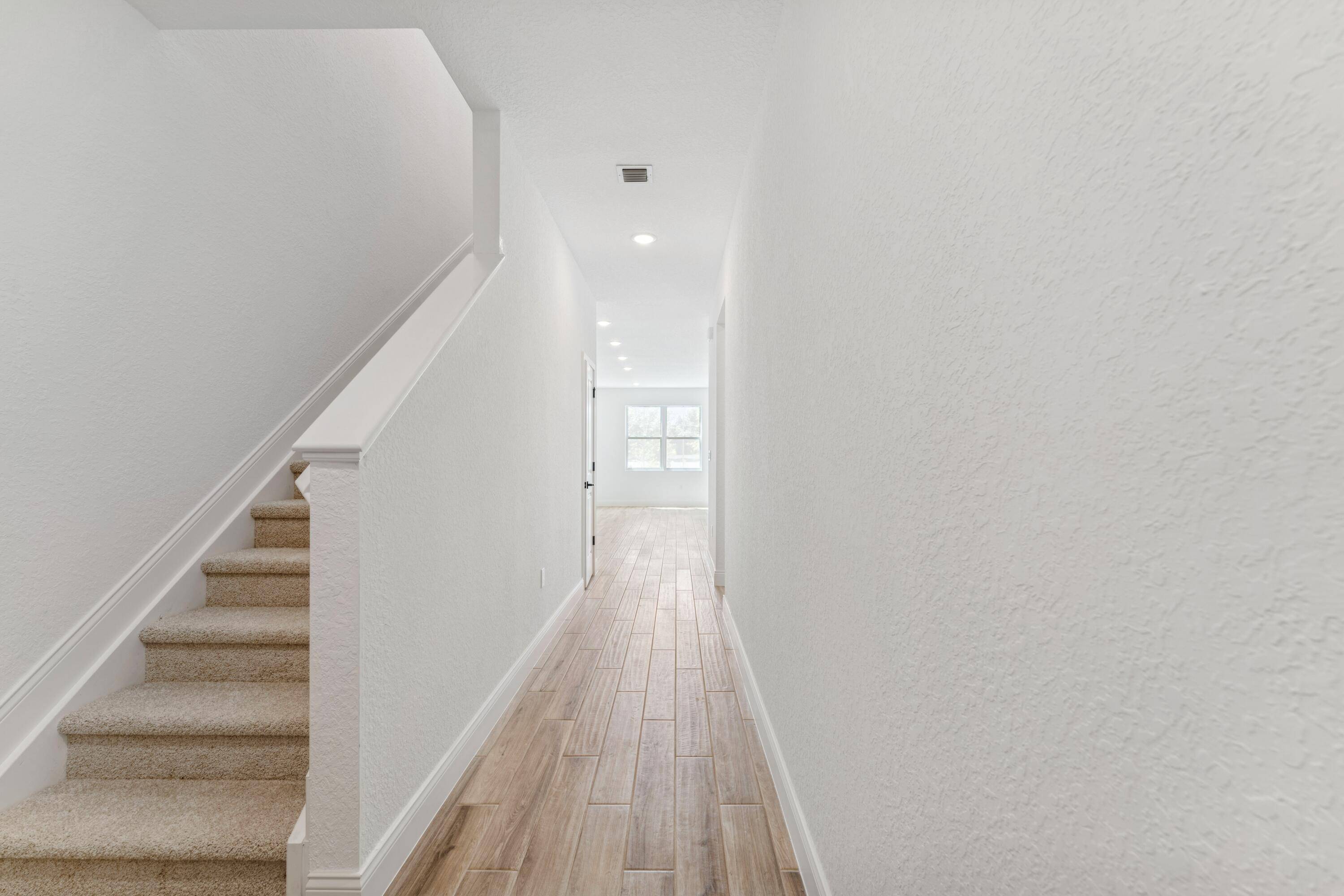 The Arabella II Style, Comfort Smart LivingStep into this beautifully designed home featuring a welcoming foyer with a decorative feature wall that sets the tone for the style within.