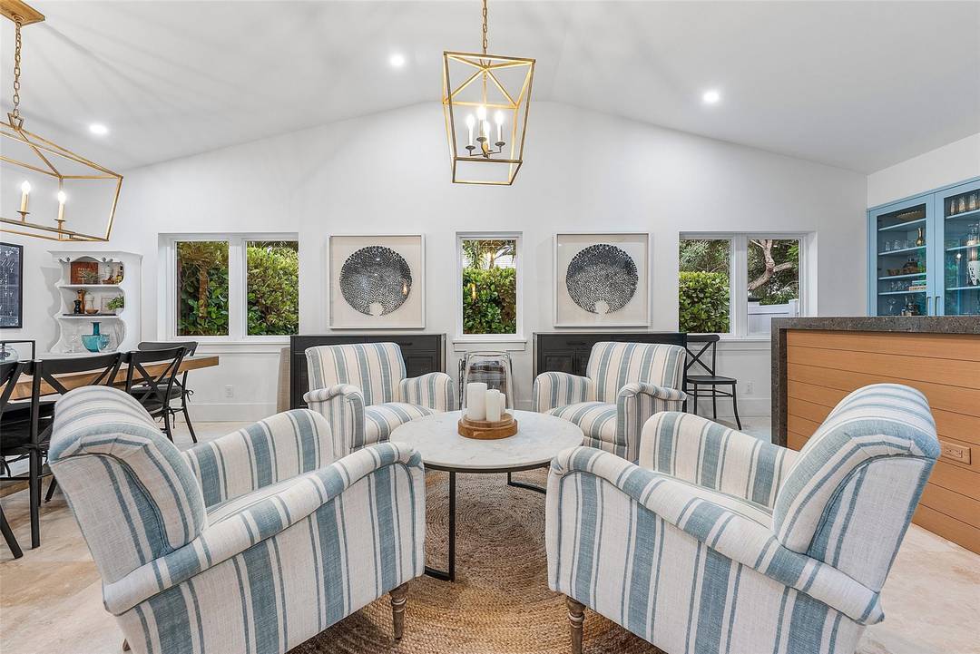 This stunning residence blends timeless farmhouse charm w sleek modern design in the heart of Fort Lauderdale s prestigious Coral Ridge community.