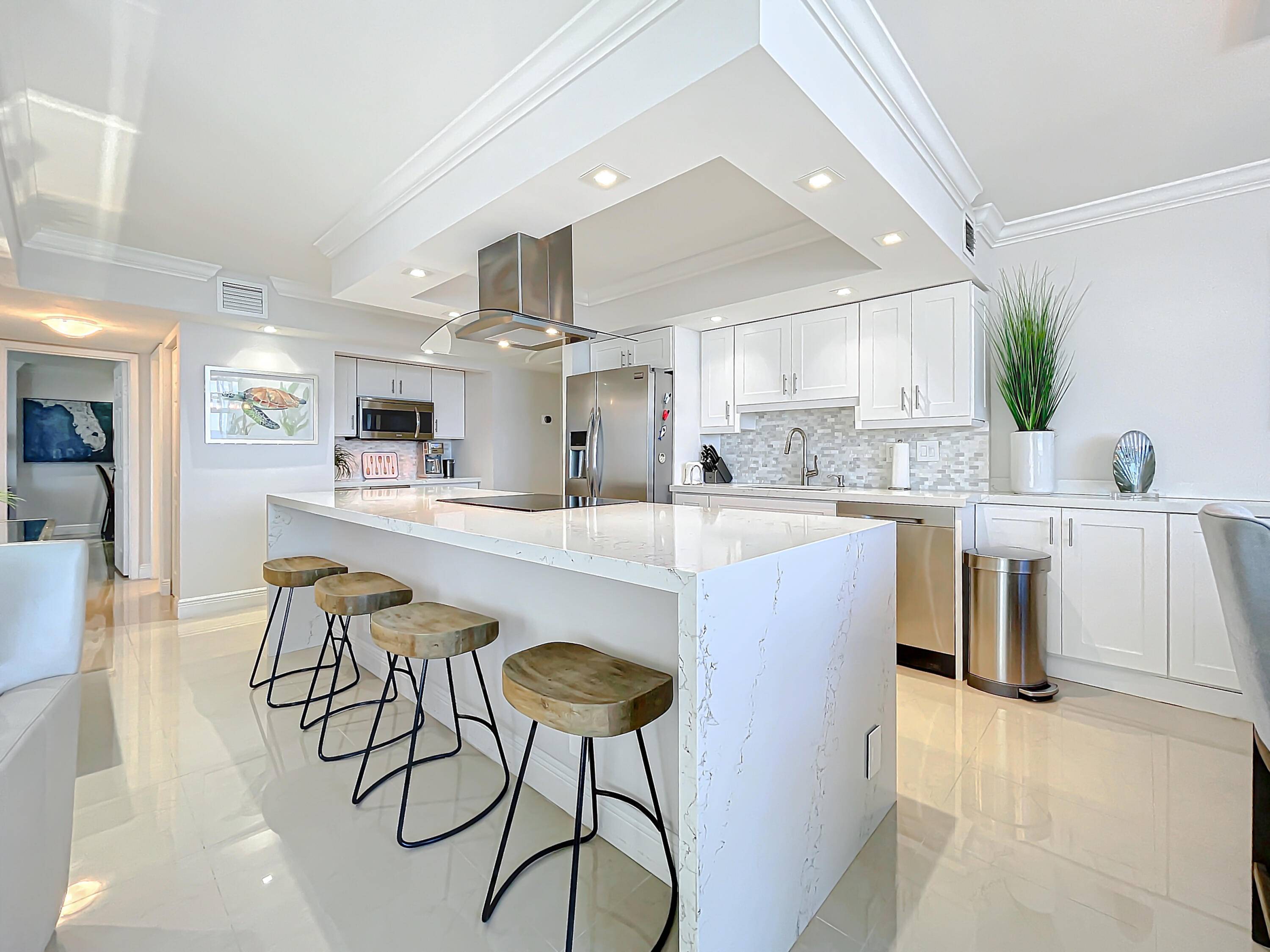 Spectacular fully updated and FULLY FURNISHED DIRECT OCEAN South East corner unit with wrap around terraces.