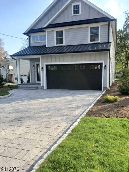 This stunning newly constructed home with builders' 10 year warranty boasts meticulous attention to detail throughout.