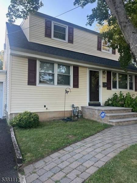 Move in ready Cape Cod that features 2 updated bathrooms and a finished basement.