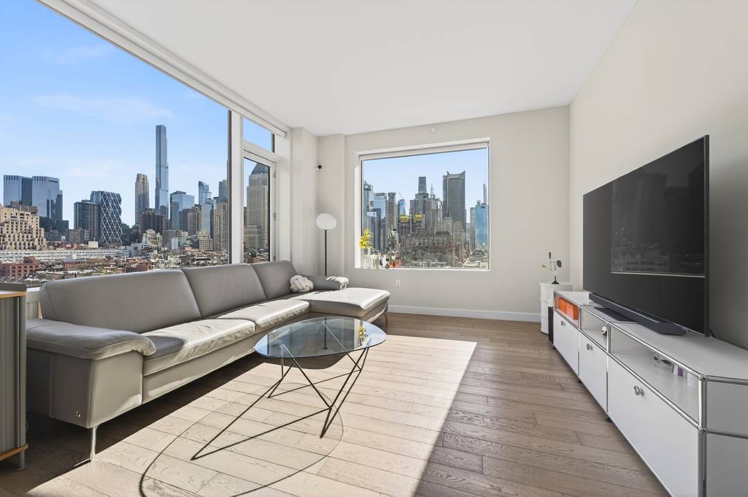 Top of the line and best in class, Apartment 14A at the highly acclaimed Charlie West is a sun flooded, view driven two bath home just below the penthouse.