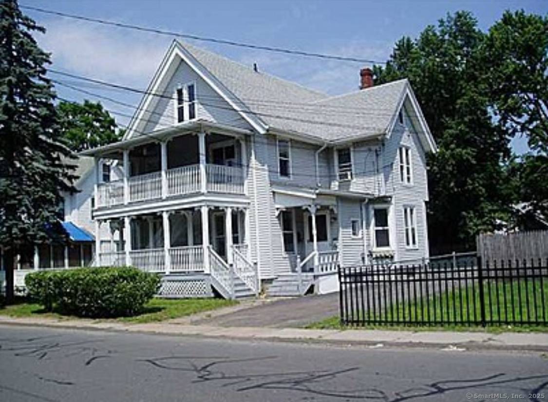 Well maintained 4 family house with plenty of off street parking.