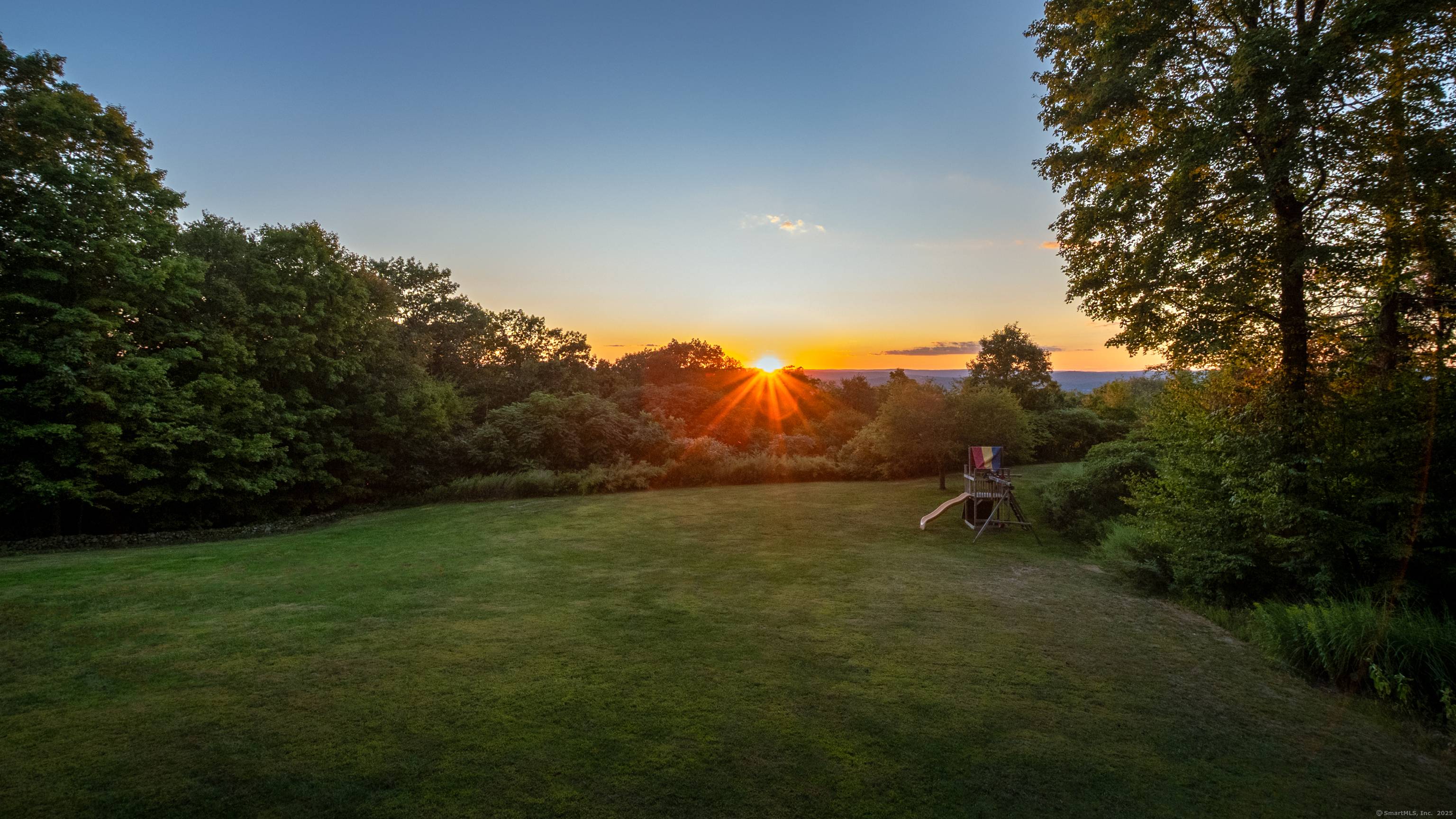 Enjoy sweeping western views of the Farmington Valley from this Jack Kemper designed 5 bedroom Colonial perched atop Avon Mountain.