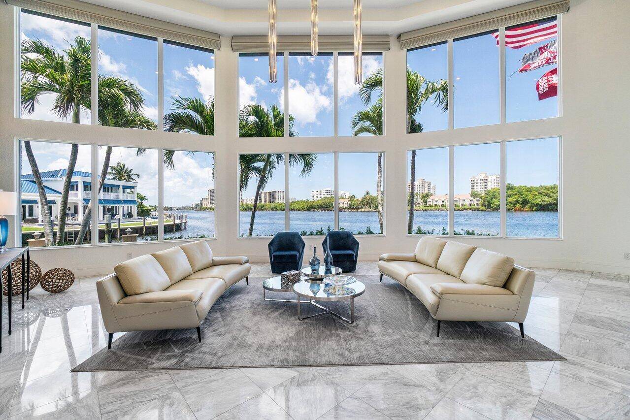 Beautifully Renovated Intracoastal Point Lot with 200 feet of Waterfrontage, dockage for a large yacht and 6649 sq ft under air.