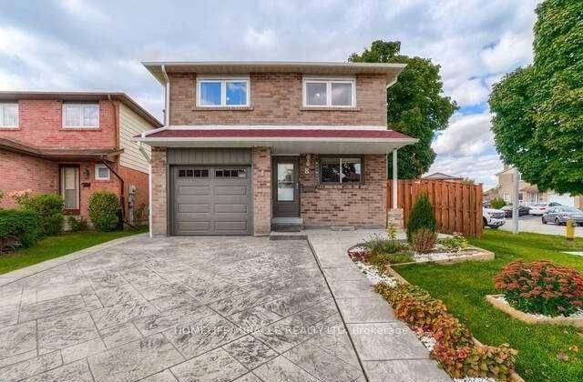 Welcome to this beautifully maintained, upgraded corner lot detached home !
