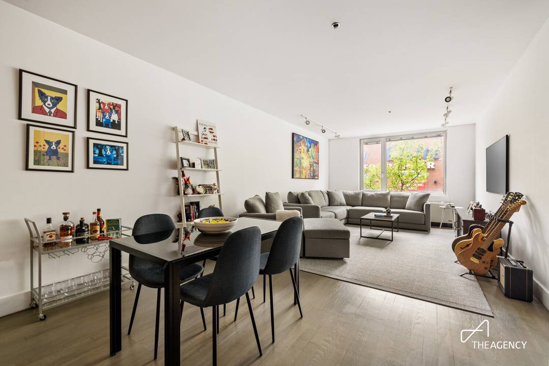 Loft like living on the LES courtesy of this truly expansive 1 bed home that features Over 350 sq.