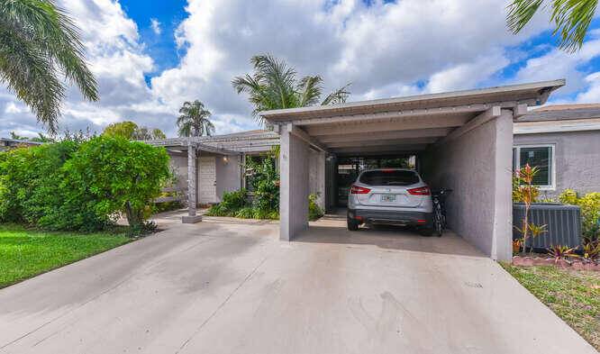 Welcome to this beautifully updated villa in Camelot Village.