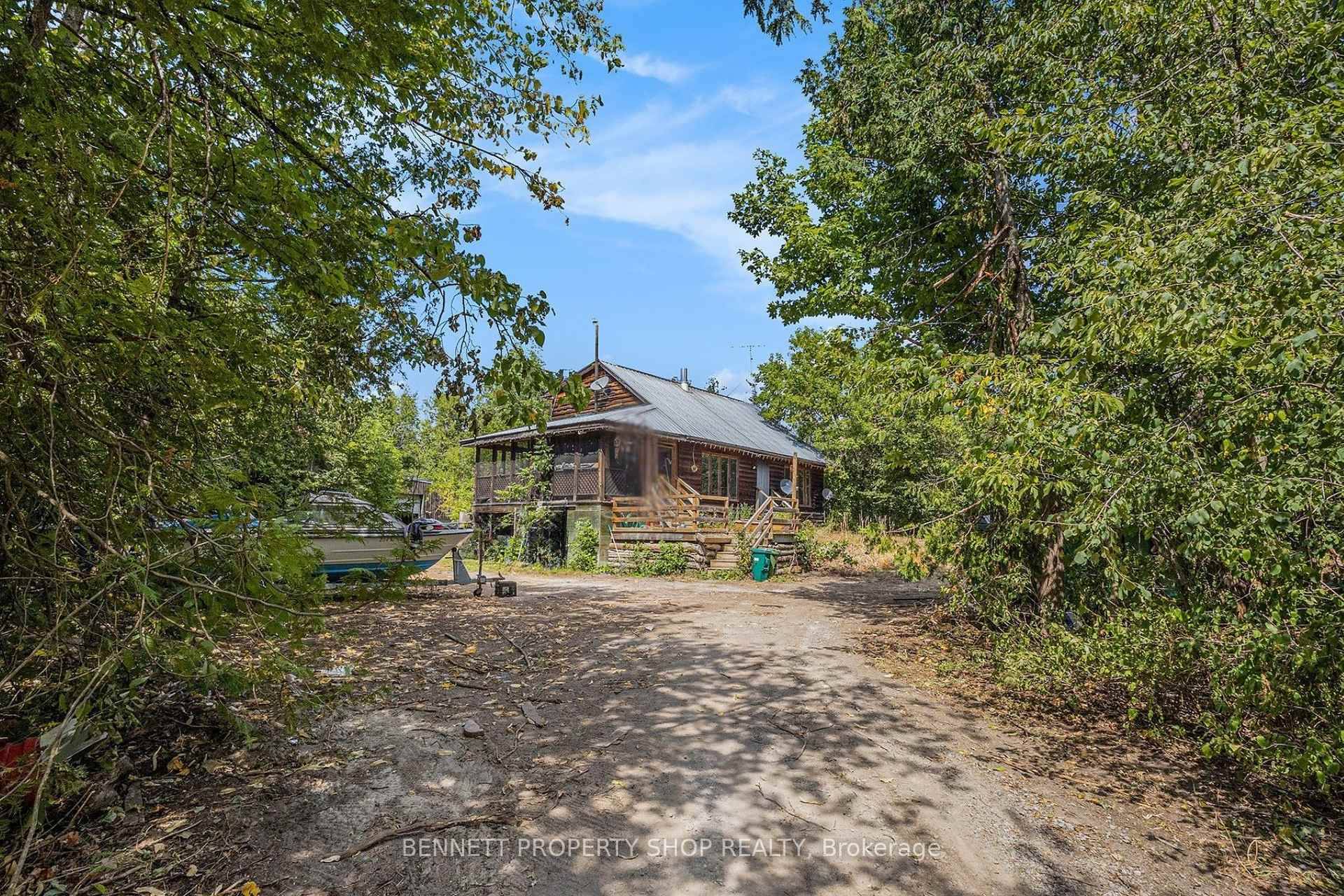 Discover the perfect blend of privacy and convenience on this fully treed 29 acre retreat, ideally located just minutes from Kanata and Highway 417.