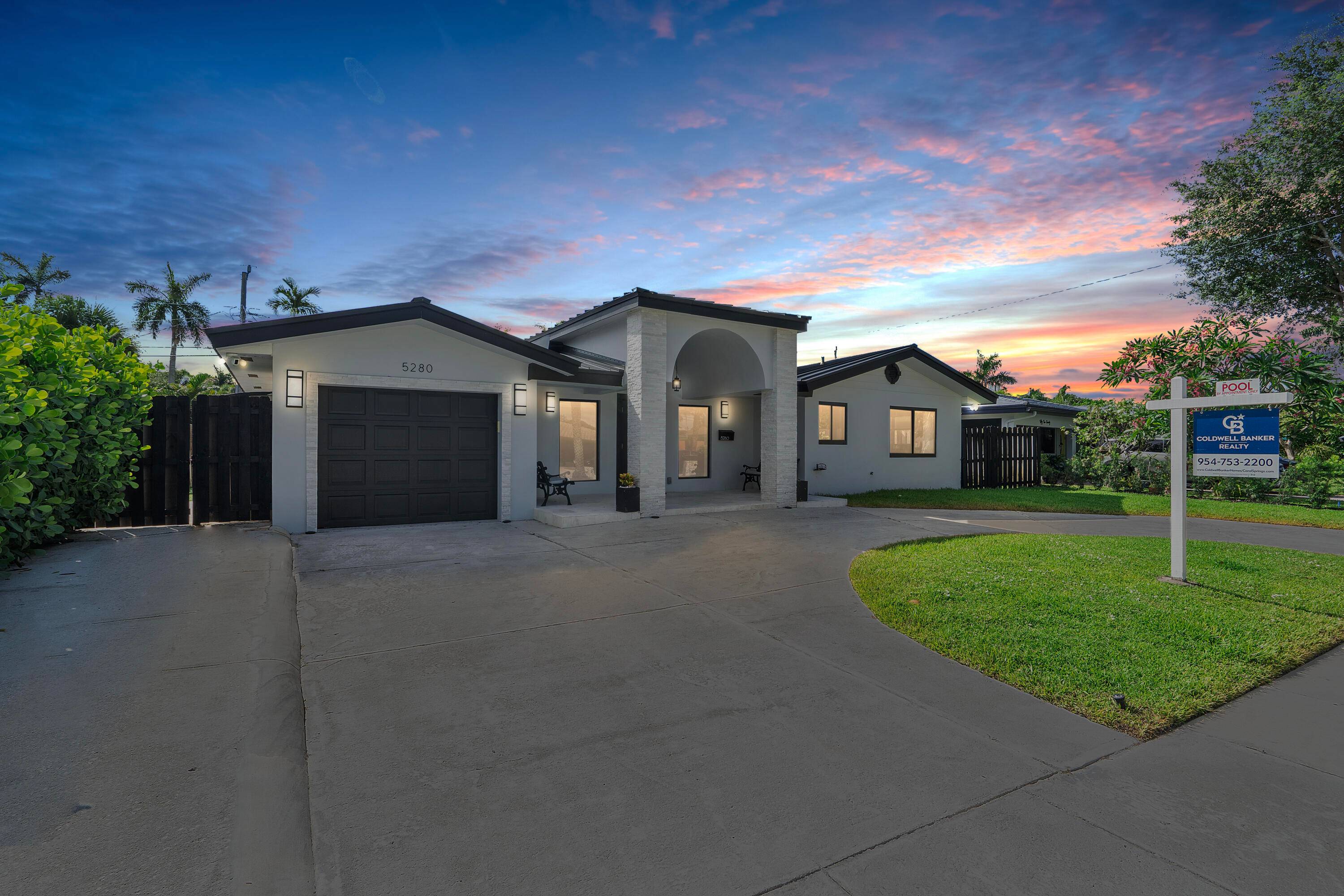 An exceptional blend of sophisticated design and effortless South Florida living in the prestigious Coral Ridge Isles community.