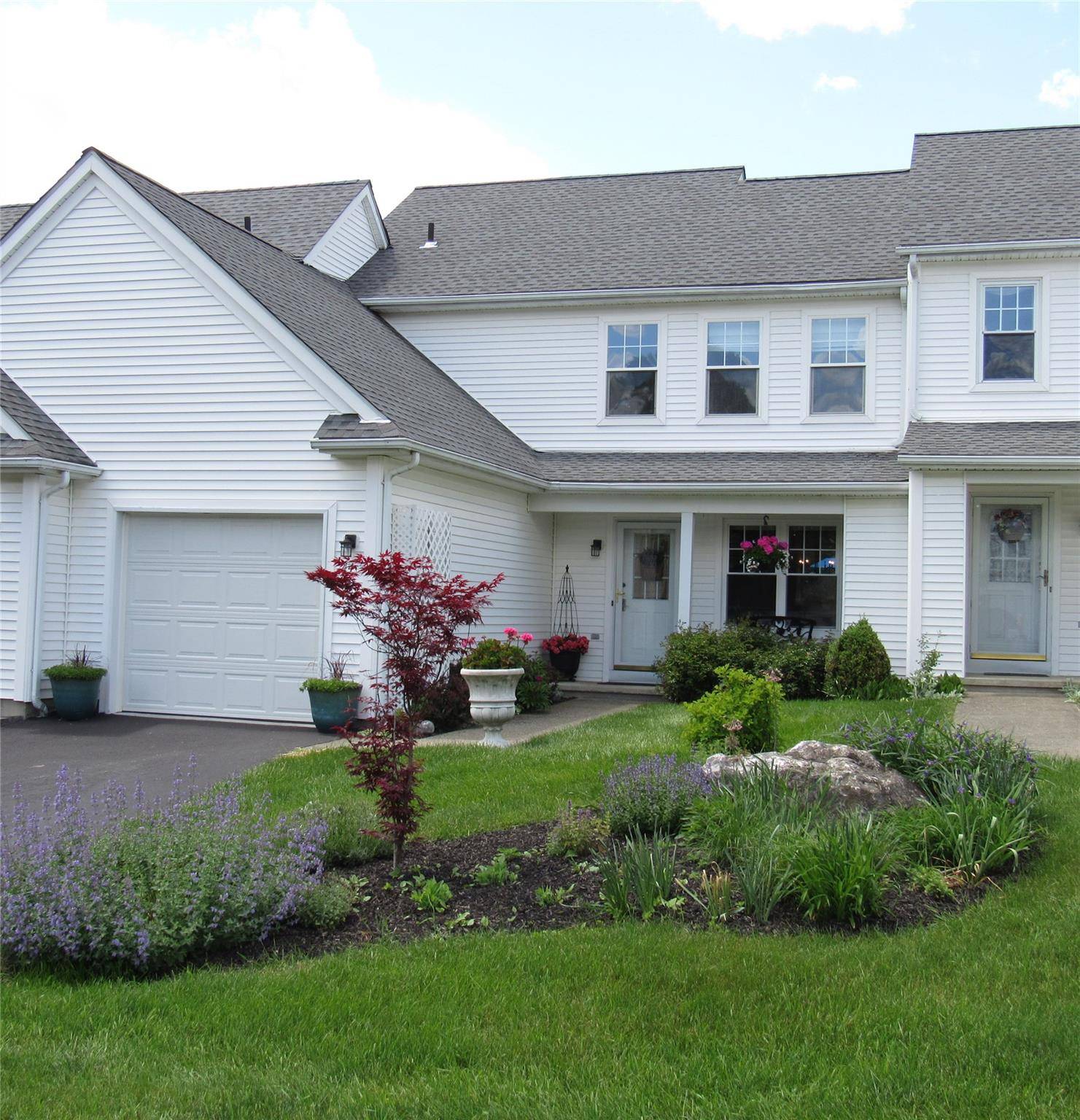 Welcome to this tastefully renovated 2 bedroom townhouse nestled in the highly sought after Dalton Farm community.