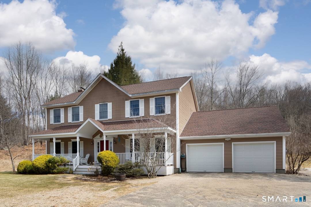 Privately set at the end of a long drive and surrounded by protected and conservation land, this well cared for home offers 16.