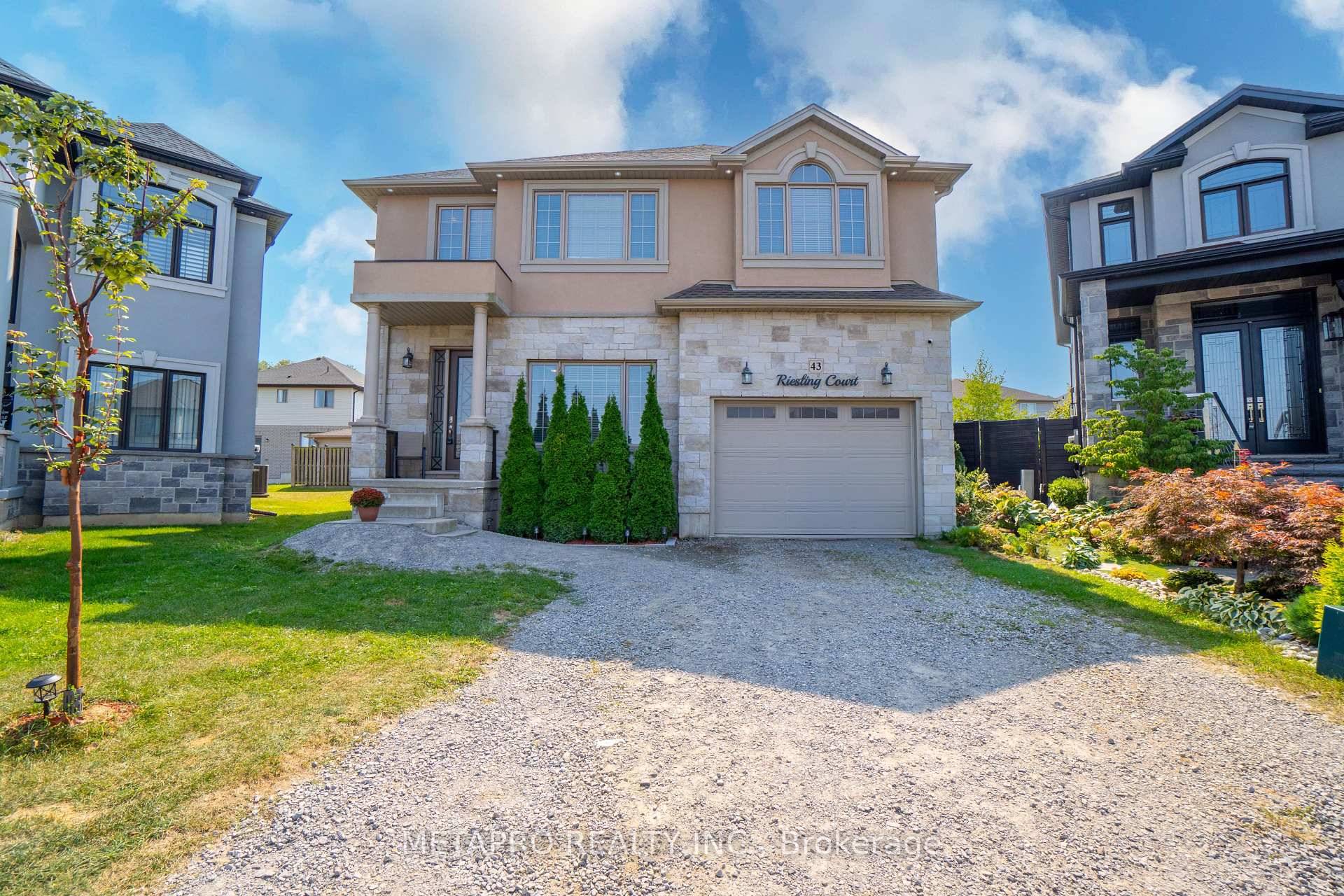 Absolutely stunning ! This custom brick and stone stucco home offers approximately 2, 700 sq.
